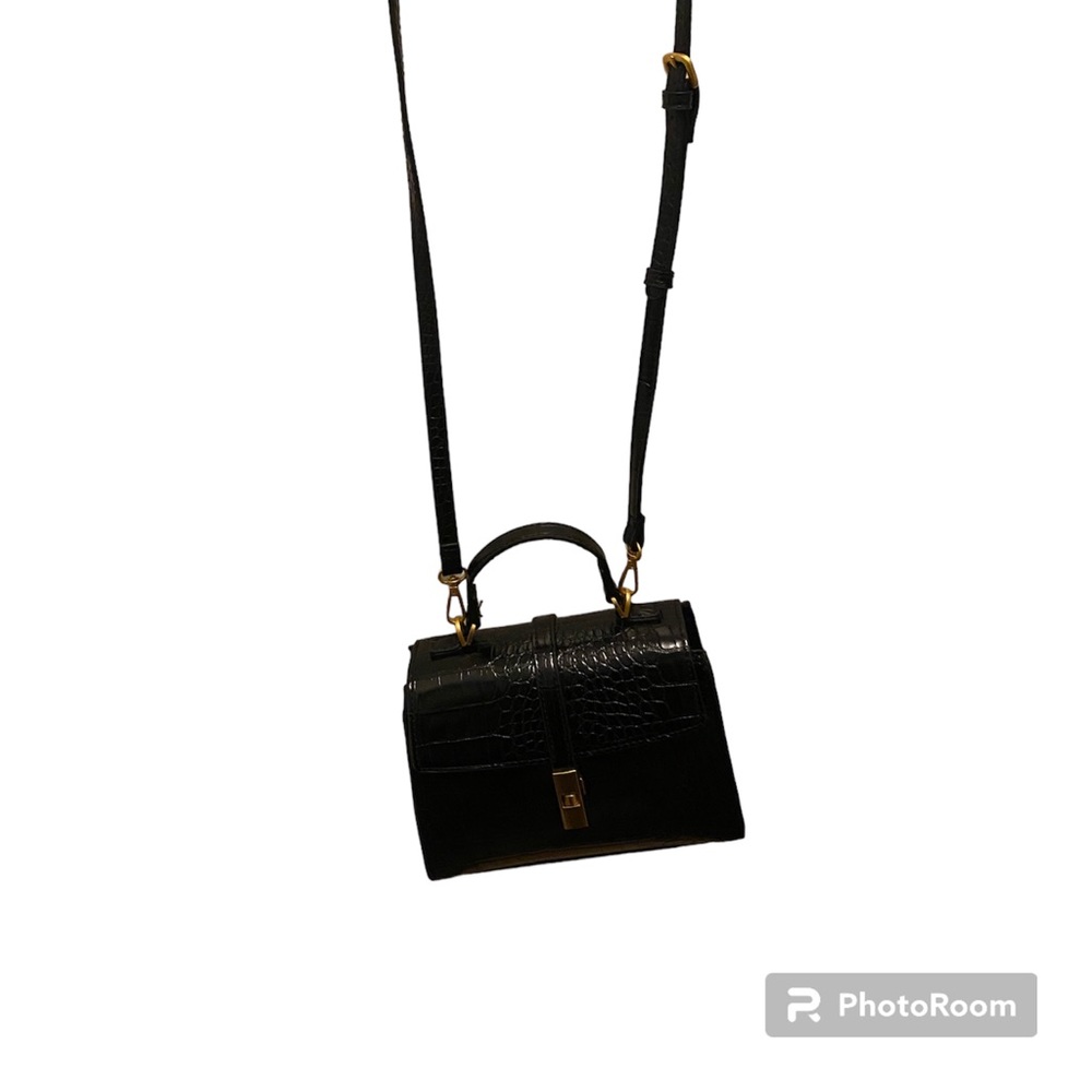 Cute vegan black leather bag.  New without tags.